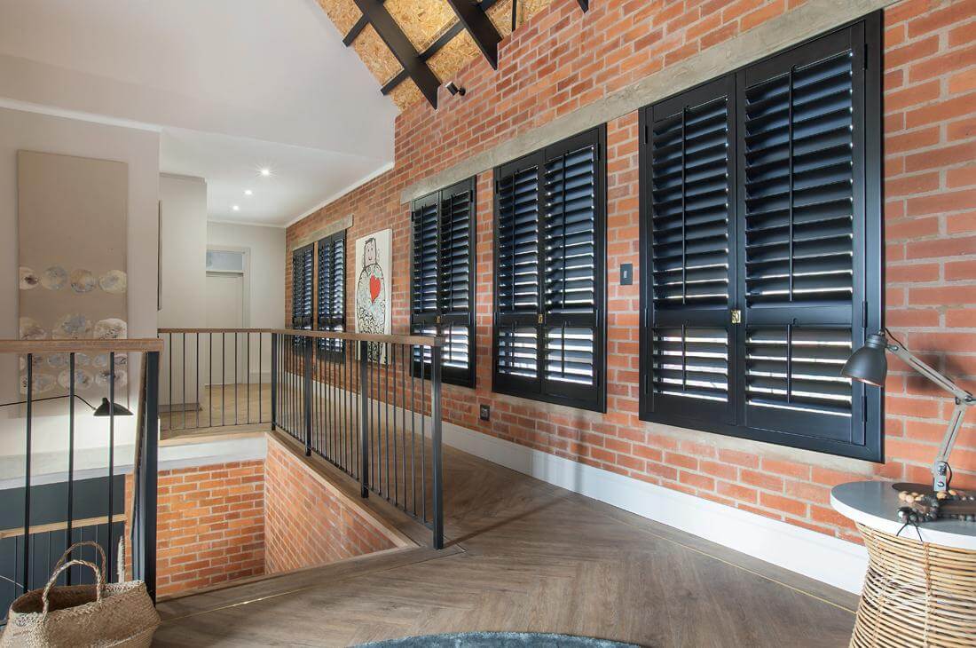 Black wooden shutters in an apartment in Cape Town